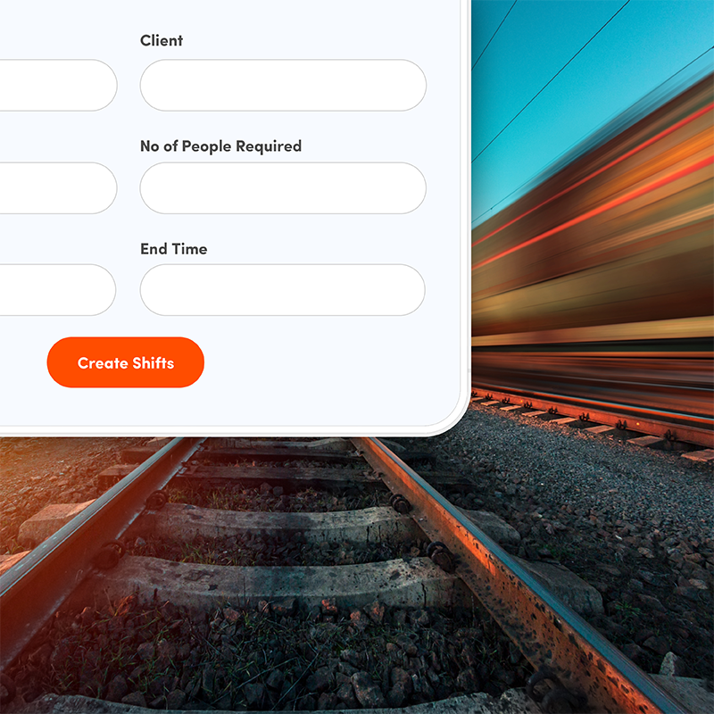 Train tracks with fast-moving train, showing Elevate labour management system for simple shift creation in rail operations.