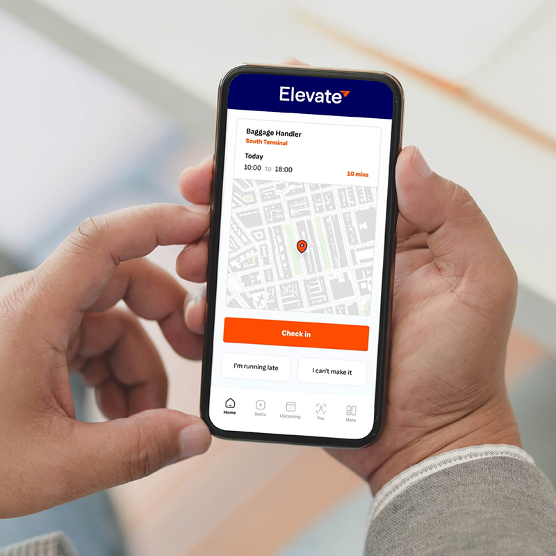 Employee checking in to their location using the Elevate staff scheduling software on their phone, connecting the workforce and reducing admin.
